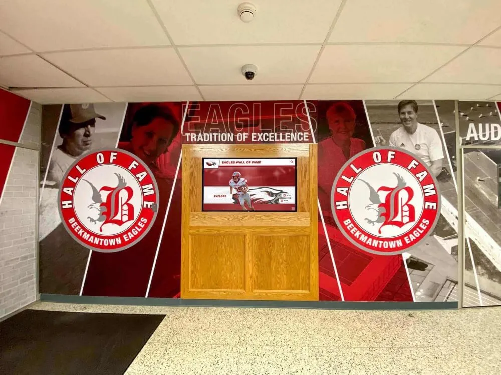School hall of fame wall celebrating student achievement Beekmantown Eagles Hall of Fame wall display