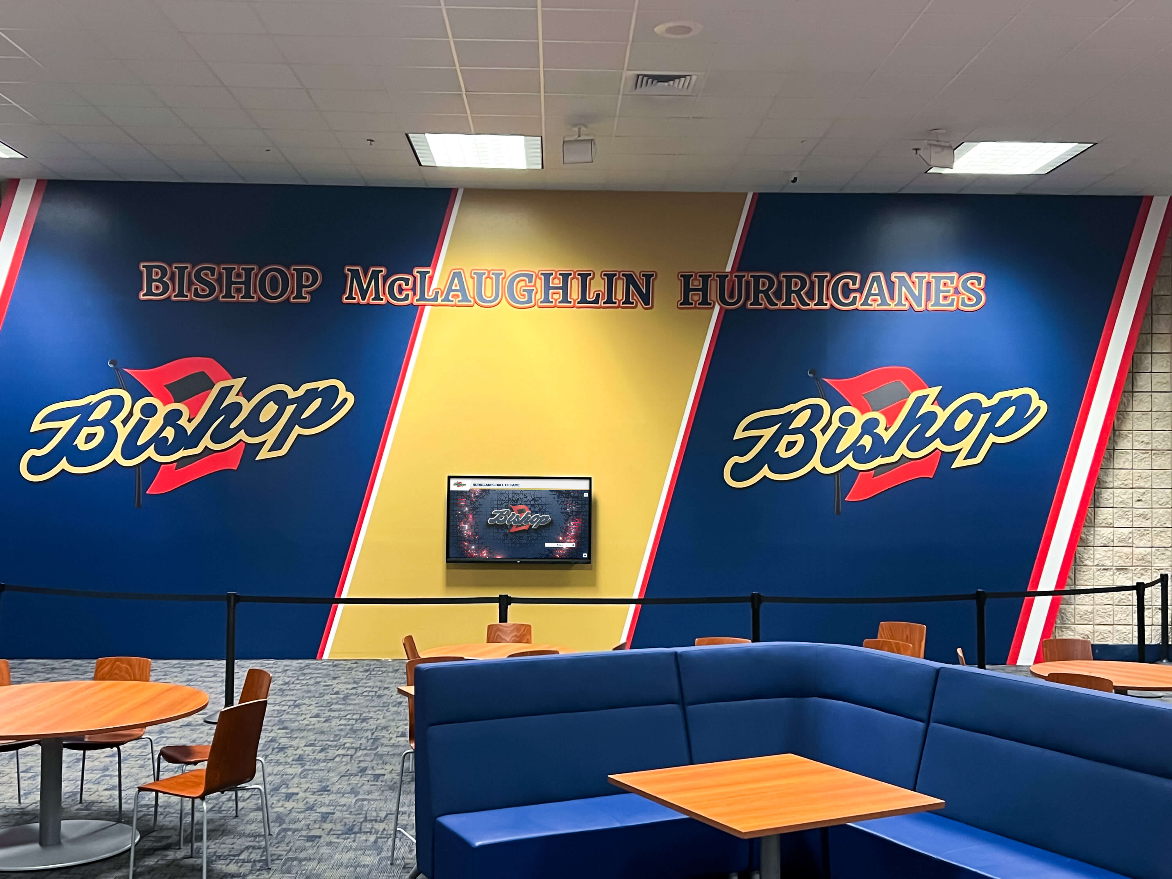 Bishop McLaughlin Hurricanes cafeteria lounge mural