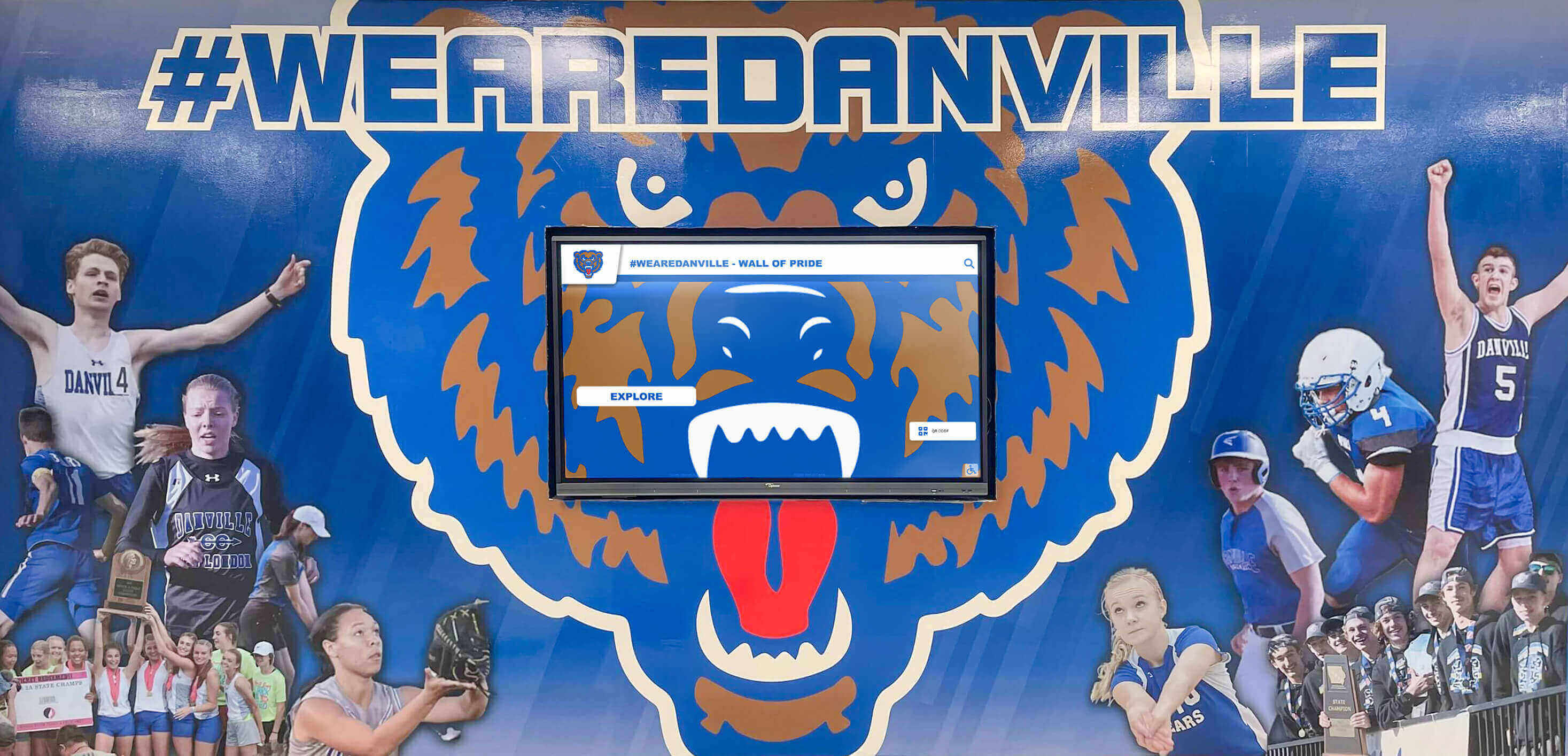 Bear mascot mural with digital display