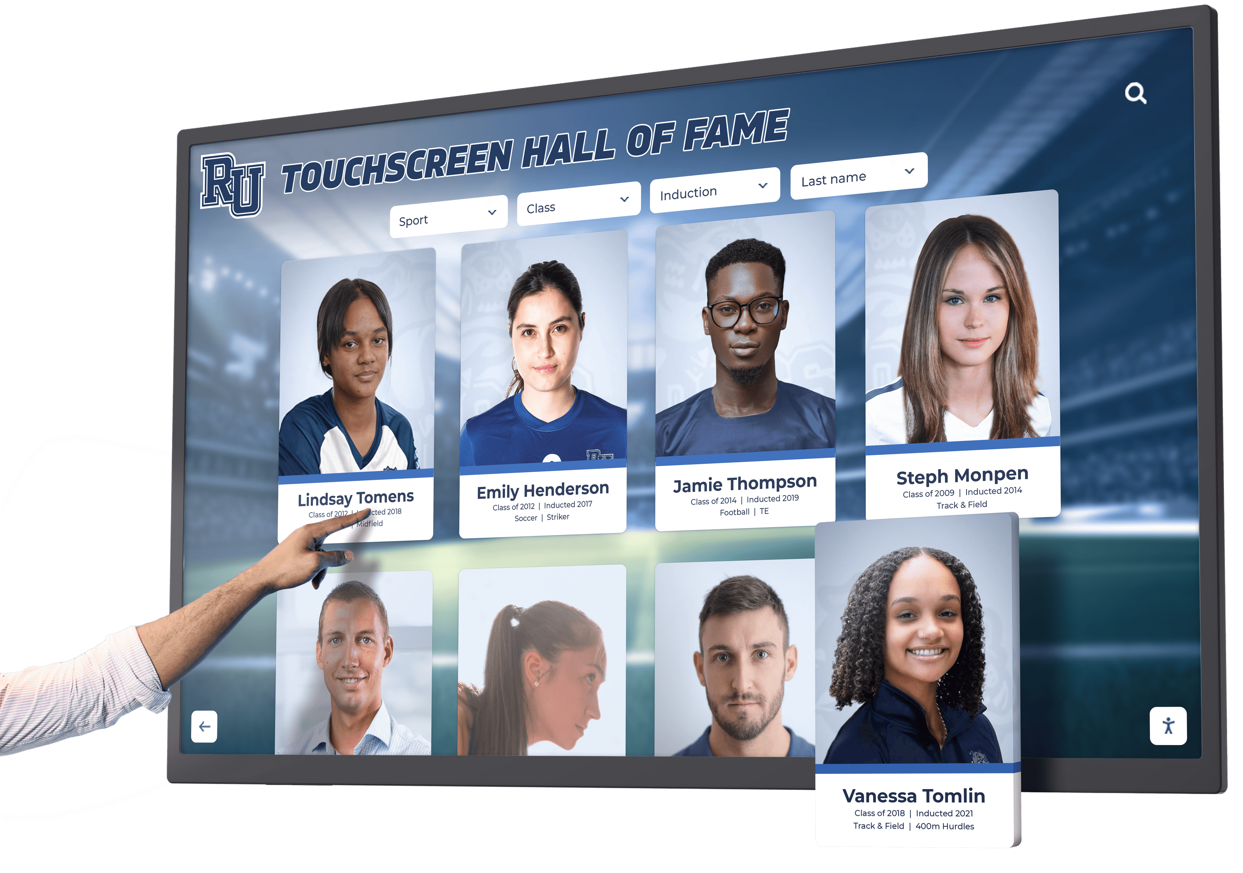 Close-up of a hand touching a touchscreen hall of fame display showing athlete portrait cards at a stadium venue