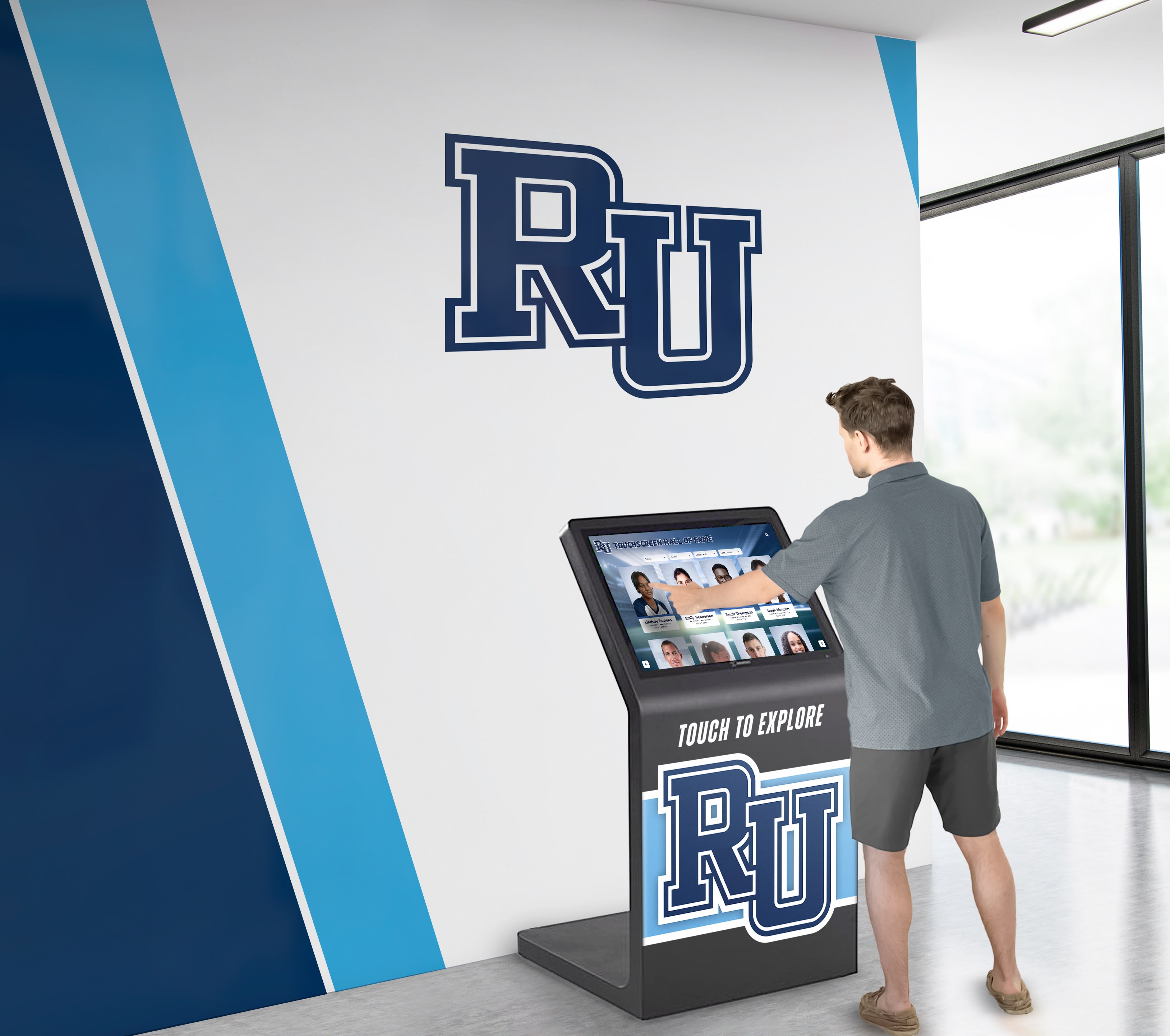 Interactive digital kiosk displaying student recognition profiles in school campus lobby Person using RU touchscreen kiosk in campus lobby showing digital recognition system